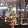 Live shot from the side of Red Moon Travelers. Robbie and Rich onstage.